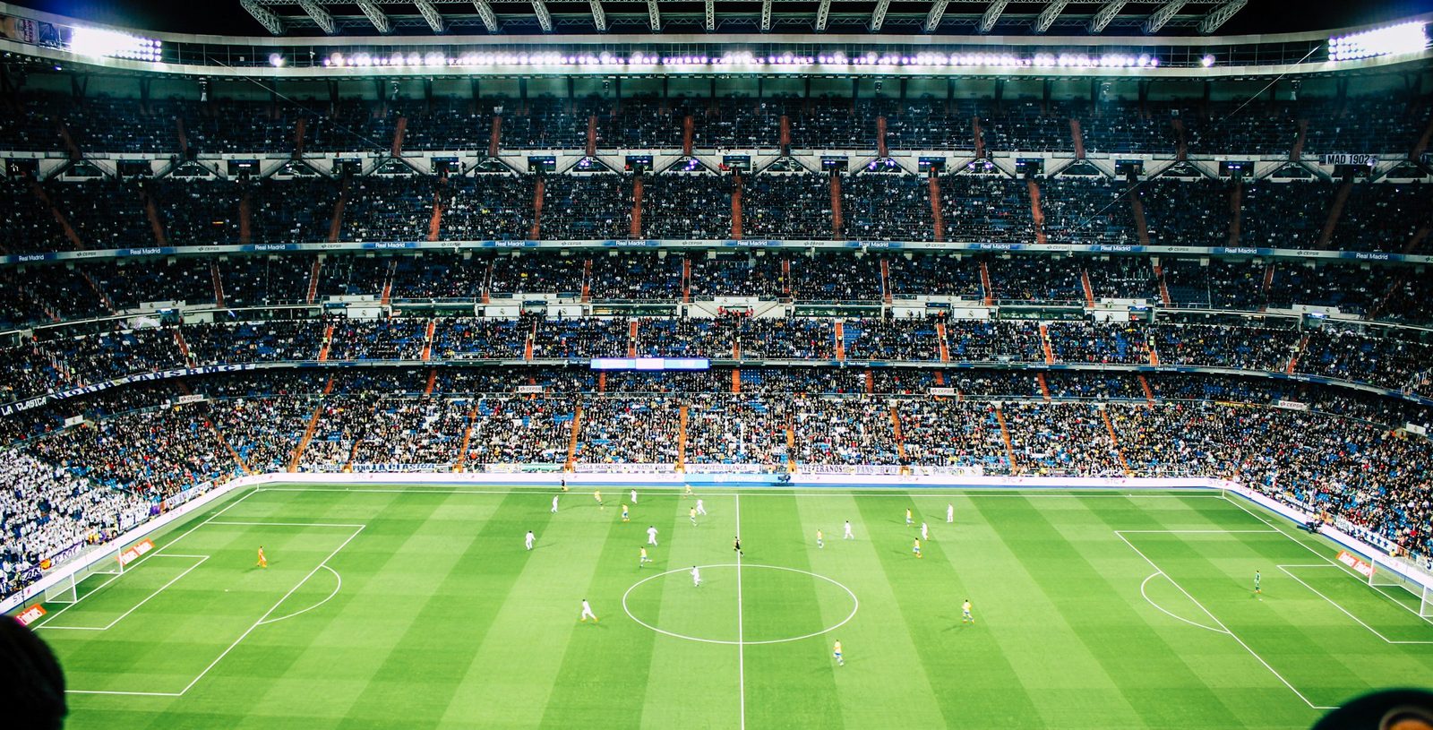 A football stadium under floodlights streamed live in 4K on SonixaIPTV